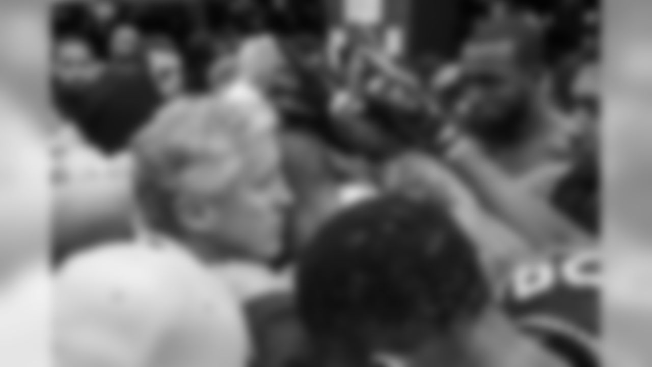 The Seahawks join hands in the locker room for the last time in the 2015 season after falling to Carolina, 31-24 in the divisional round of the playoffs.