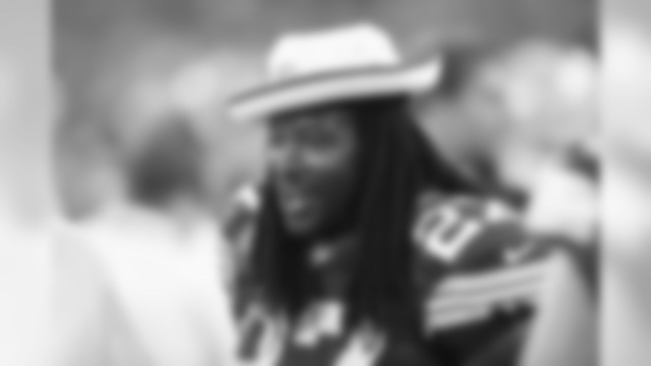 Green Bay Packers' Eddie Lacy on the sidelines during the second half of an NFL preseason football game against the Oakland Raiders Friday, Aug. 22, 2014, in Green Bay, Wis. (AP Photo/Mike Roemer)