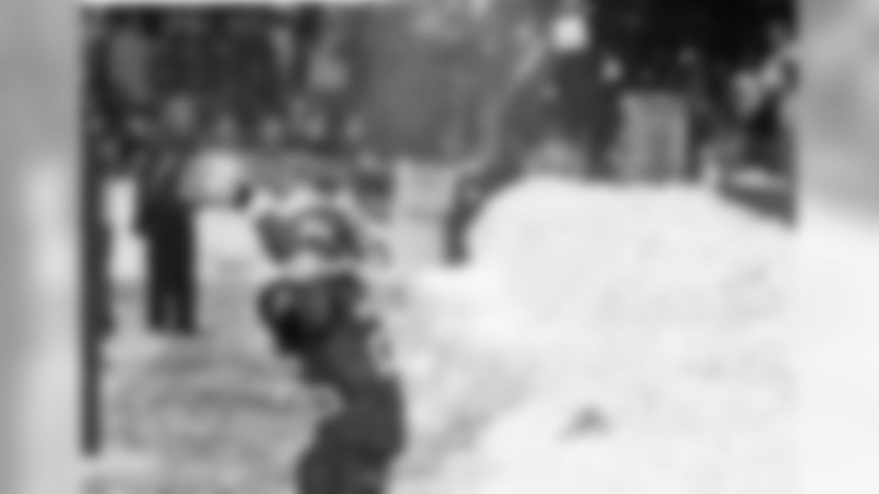 Seattle Seahawks' Josh Wilson tosses snow into the air and toward fans after intercepting a New York Jets pass in the second half of an NFL football game Sunday, Dec. 21, 2008, in Seattle. The Seahawks won 13-3. (AP Photo/Elaine Thompson)