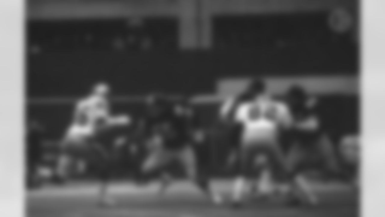 Action photograph of offensive lineman Jon Kolb #55 during his time with the Steelers.