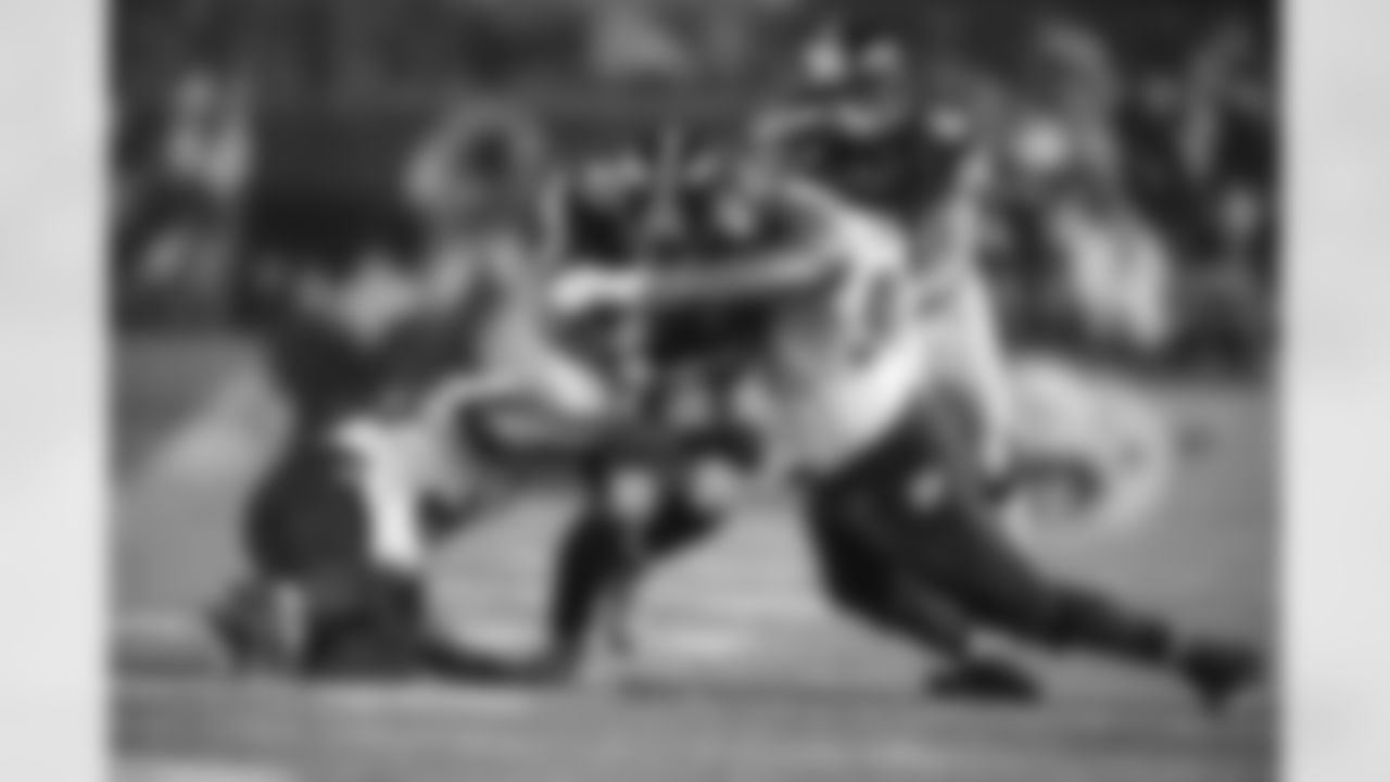 Josh Harris plows through the defense.