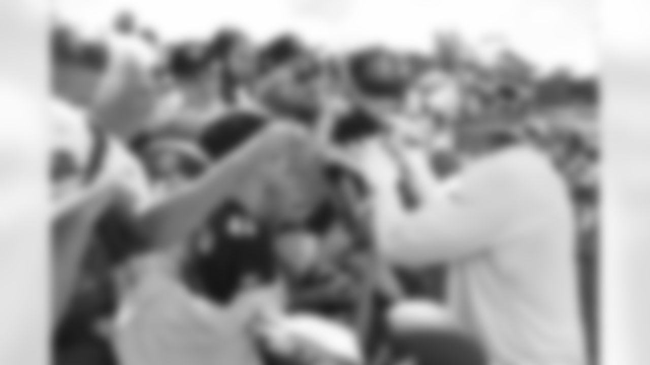 Pittsburgh Steelers linebacker T.J. Watt (90) and fans at Saint Vincent College during the 2022 Steelers Training Camp on Saturday, July 30, 2022 in Latrobe, PA. (Karl Roser / Pittsburgh Steelers)