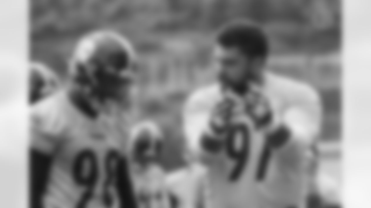 Pittsburgh Steelers defensive end DeMarvin Leal (98) and Pittsburgh Steelers defensive tackle Cameron Heyward (97) participate in the Organized Team Activities (OTAs), Thursday May 26, 2022 at the UPMC Rooney Sports Complex. (Abigail Dean / Pittsburgh Steelers)