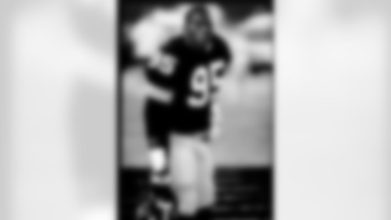 Action shot of linebacker Greg Lloyd #95 during his time with the Pittsburgh Steelers.