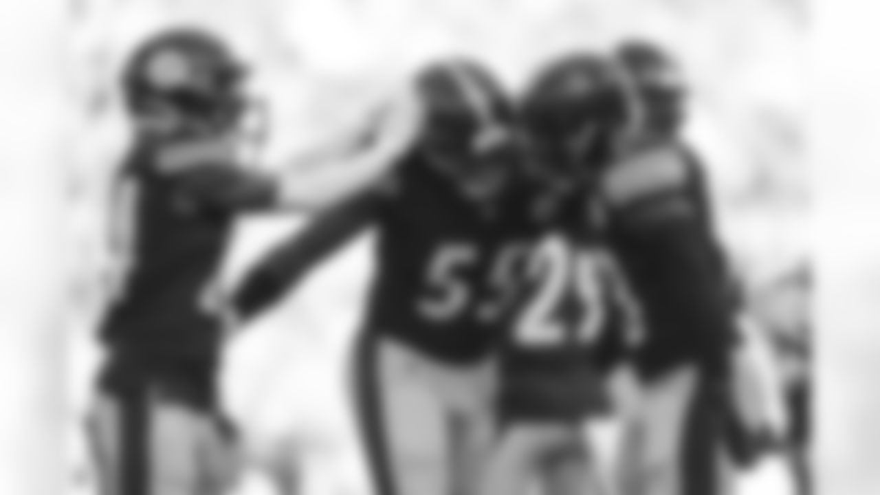 Pittsburgh Steelers linebacker Devin Bush (55) and Pittsburgh Steelers linebacker Mark Robinson (93) during a preseason game between the Pittsburgh Steelers and the Detroit Lions, Sunday, Aug. 28, 2022 in Pittsburgh, PA. The Steelers beat the Lions 19-9. ](Karl Roser / Pittsburgh Steelers)