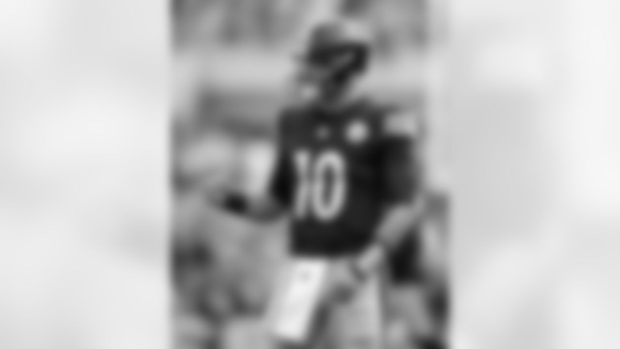 Take a look at photographs of Steelers quarterbacks from the 2022 season