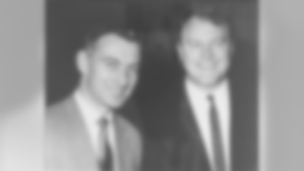 Dan Rooney poses for a photo with Chuck Noll after signing him to the Steelers head coaching position.