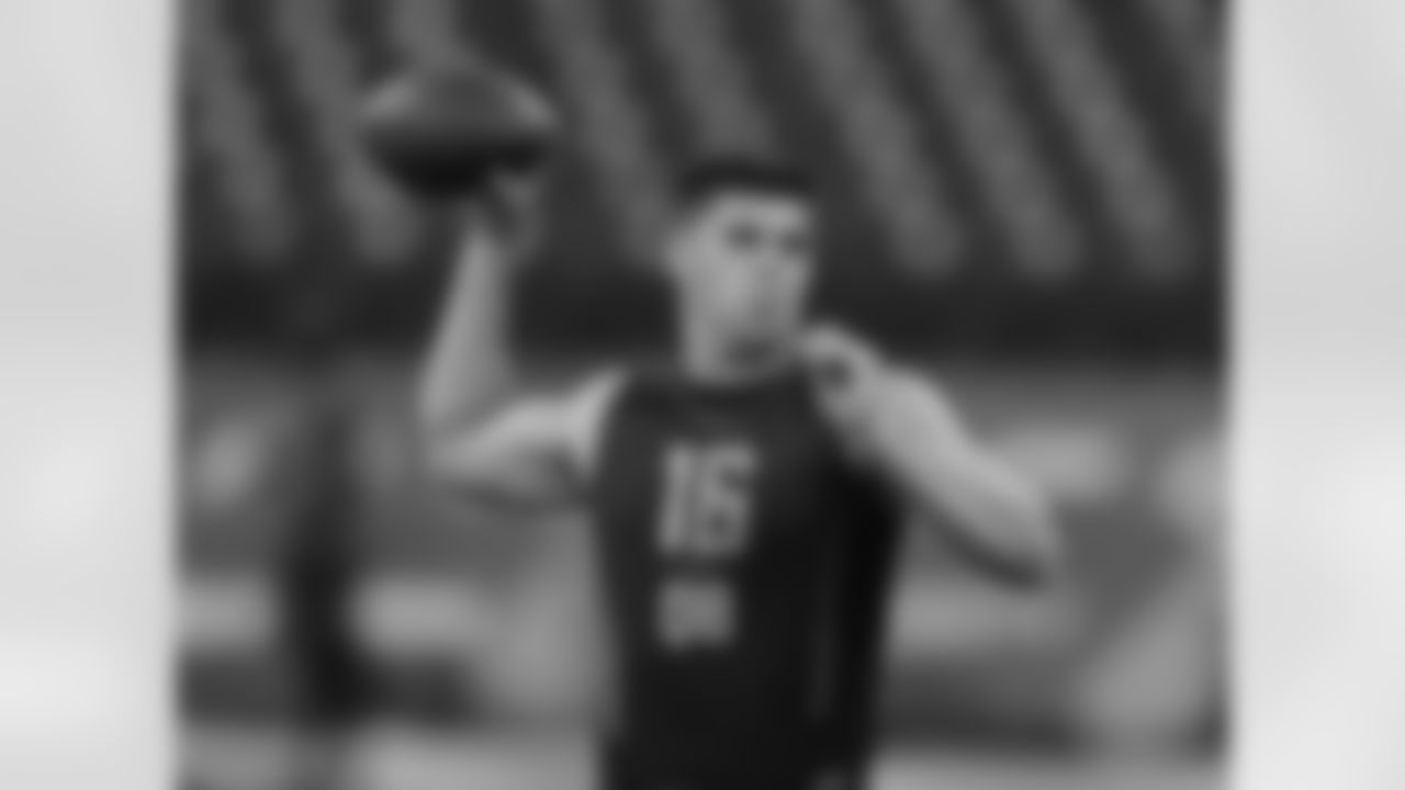 Oklahoma State quarterback Mason Rudolph throws during a drill at the NFL football scouting combine, Saturday, March 3, 2018, in Indianapolis. (AP Photo/Darron Cummings)