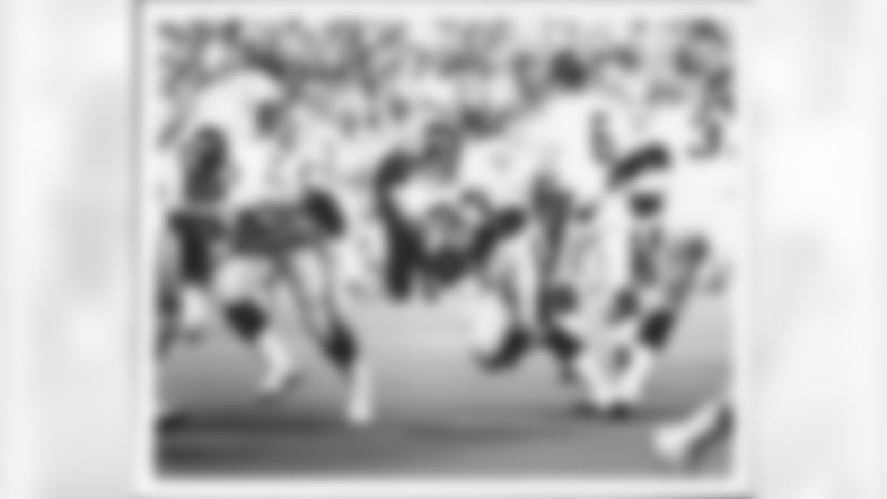 Action photograph of Merril Hoge.