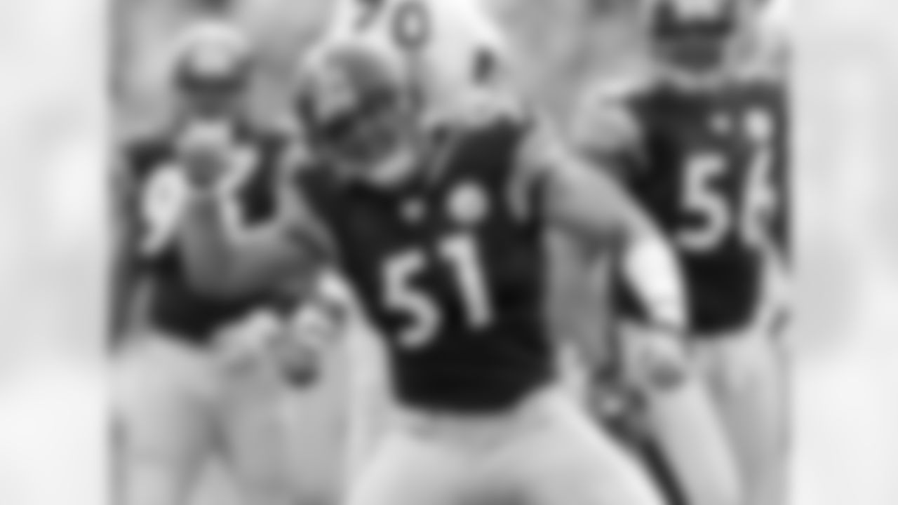 Action shot of linebacker James Farrior #51 during his time with the Pittsburgh Steelers.