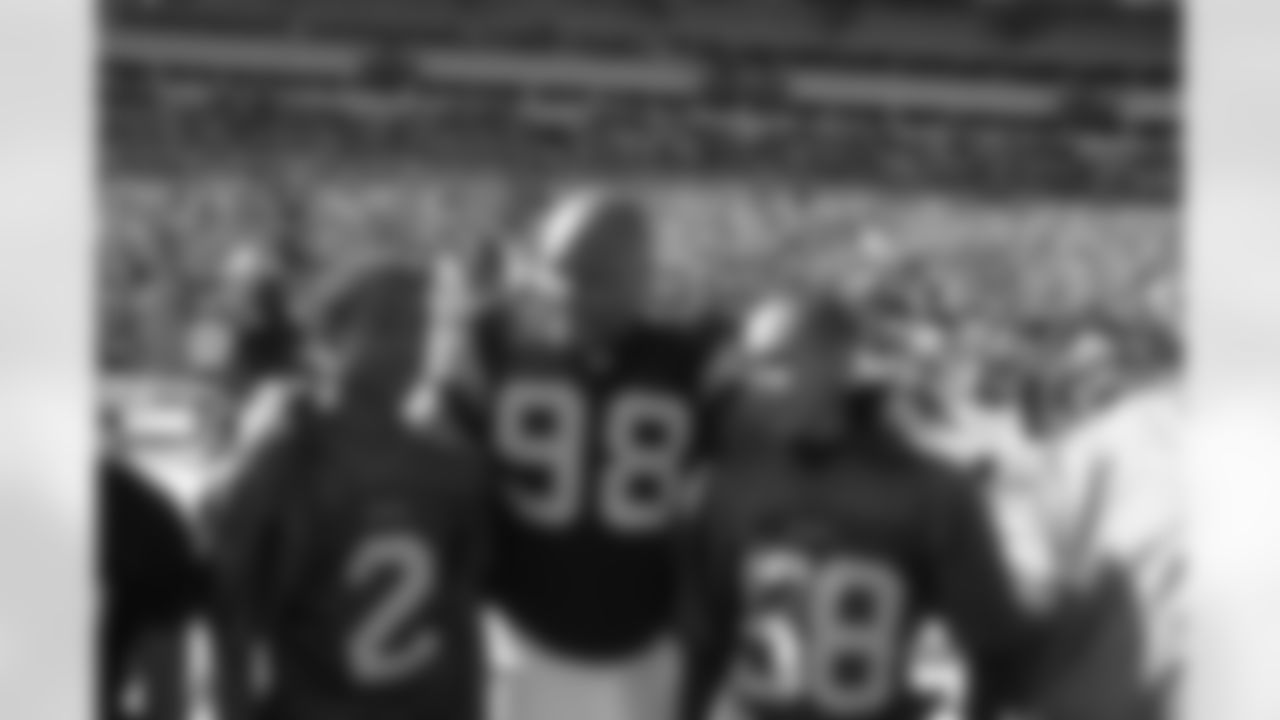 Casey Hampton and youth football players