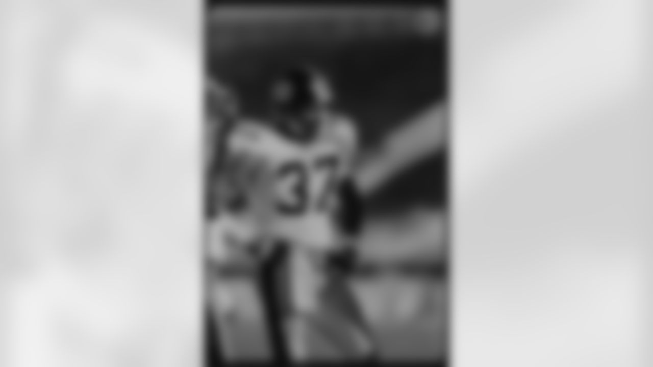 Action shot of safety Carnell Lake #37 from his time with the Steelers.