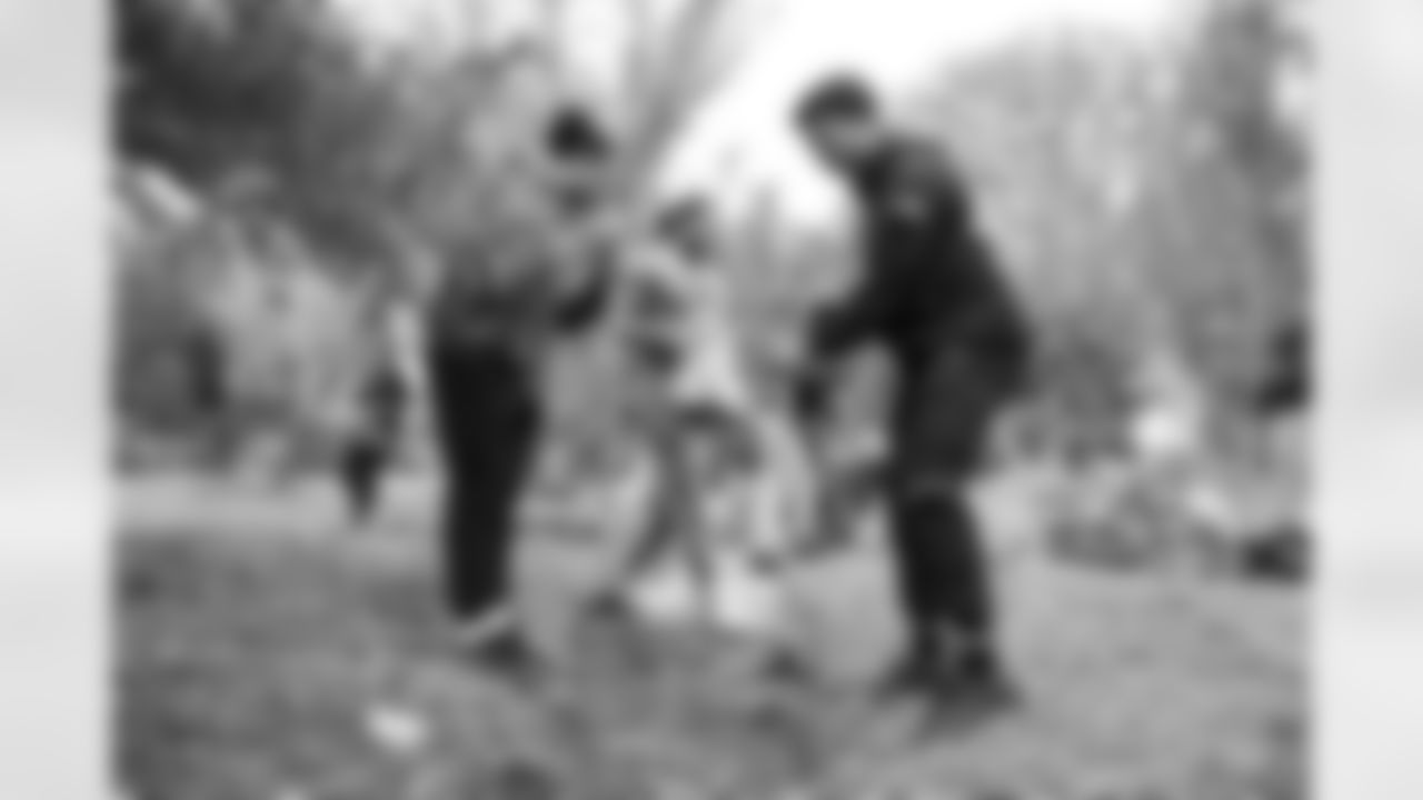 Pittsburgh Steelers defensive tackle Cameron Heyward (97) and teammates help lay a brick path during a community clean up for Cam's Kindness Week, Thursday, Sept. 29, 2022. (Abigail Dean / Pittsburgh Steelers)