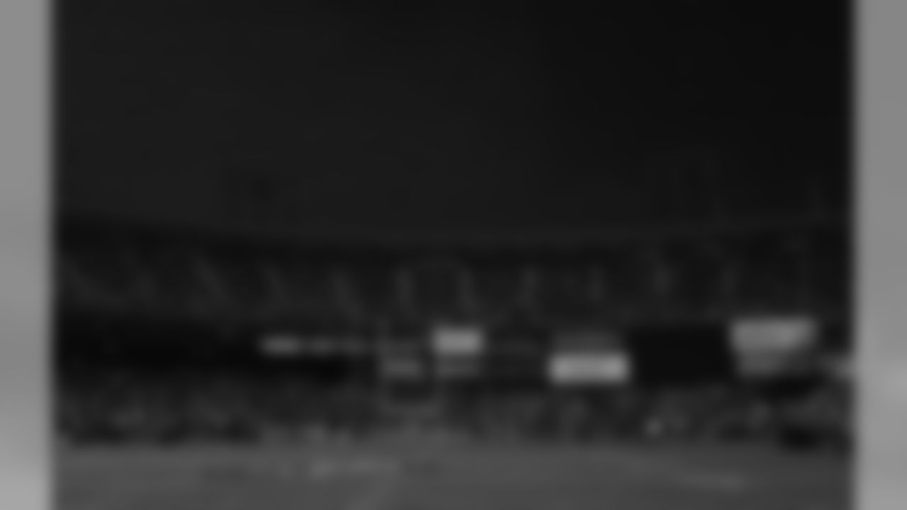 Fans and officials wait at Candlestick Park during a power outage before an NFL football game between the San Francisco 49ers and the Pittsburgh Steelers in San Francisco, Monday, Dec. 19, 2011. (AP Photo/Marcio Jose Sanchez)