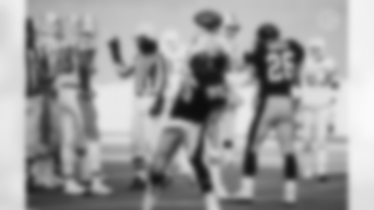 Action shot of linebacker Greg Lloyd #95 during his time with the Pittsburgh Steelers.