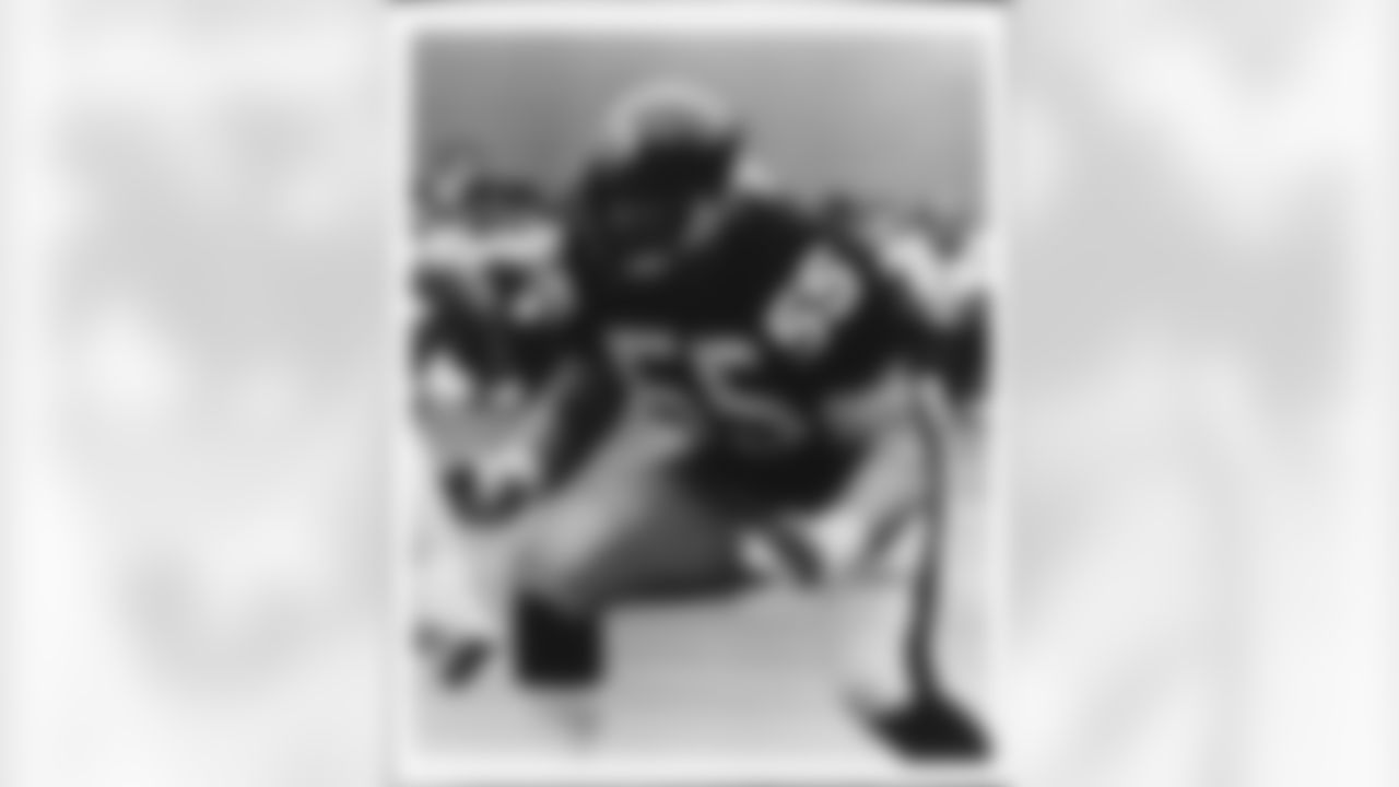 Action photograph of offensive lineman Jon Kolb #55 during his time with the Steelers.