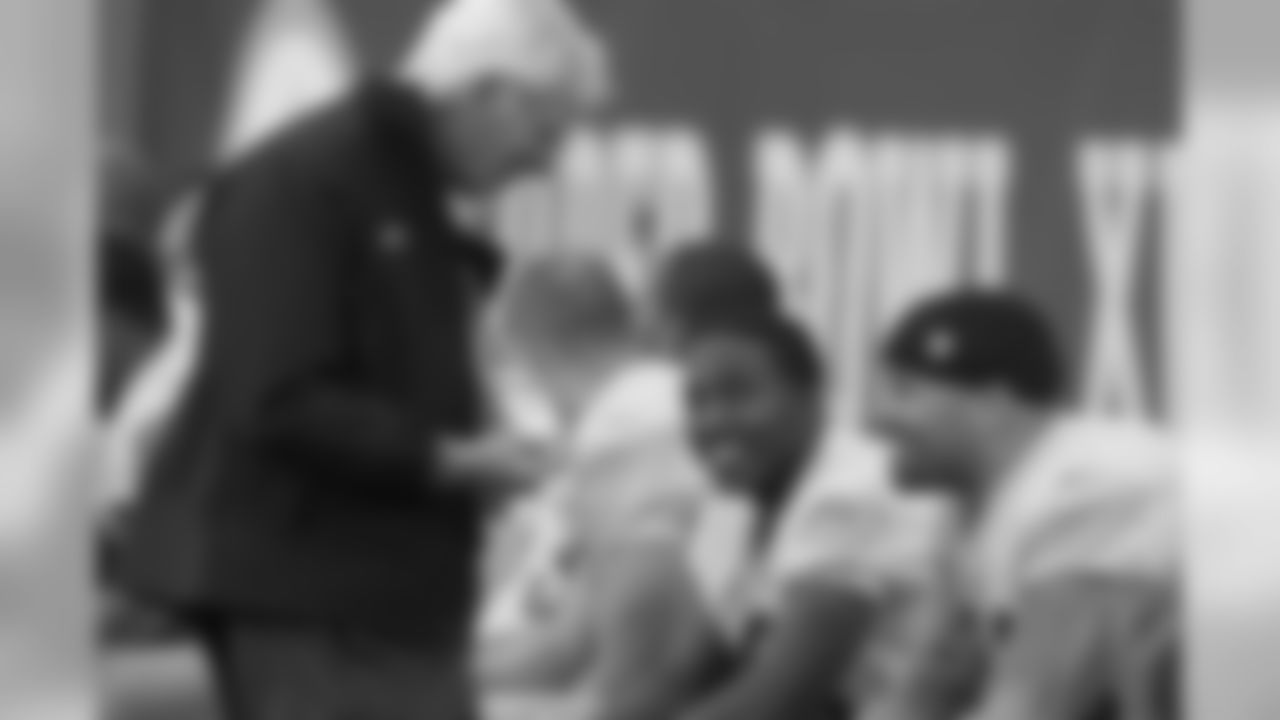 Dan Rooney talks with Deshea Townsend and Larry Foote during a practice before Super Bowl XL.
