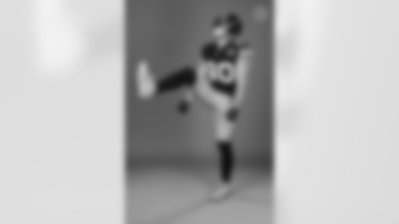 Pittsburgh Steelers linebacker T.J. Watt (90) wears the throwback uniform during a photoshoot, Tuesday, Nov. 15, 2022 in Pittsburgh, PA. (Karl Roser / Pittsburgh Steelers)