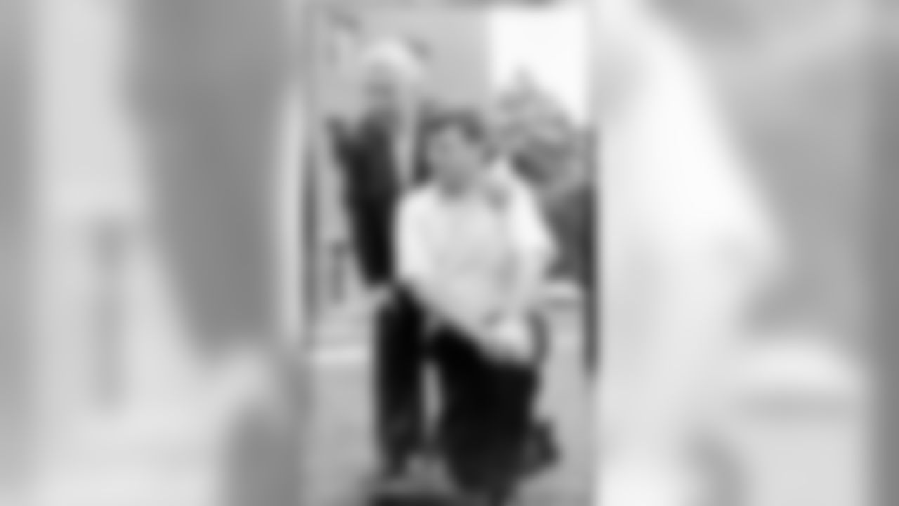 A portrait of Dan Rooney with his father Art Rooney.