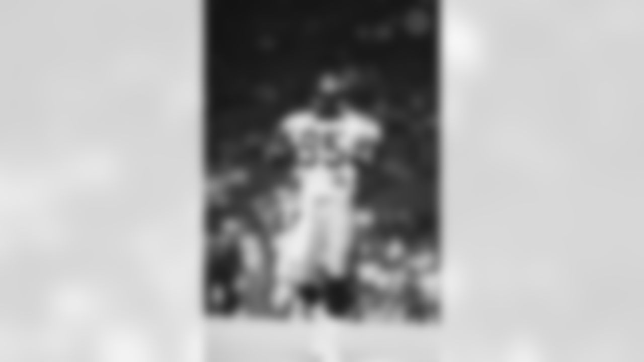 Action shot of linebacker Greg Lloyd #95 during his time with the Pittsburgh Steelers.