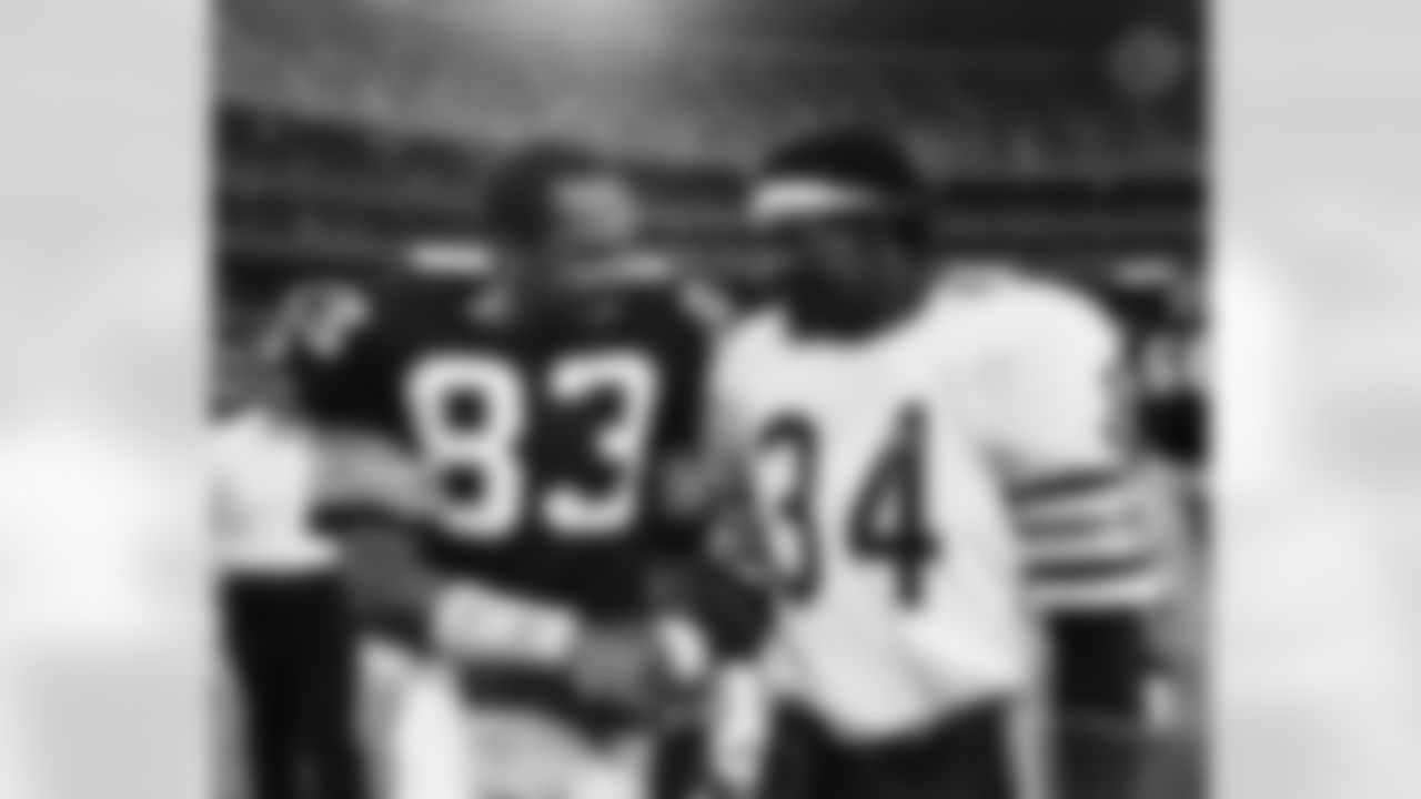 Action photograph of wide receiver Louis Lipps #83 during his time with the Steelers.