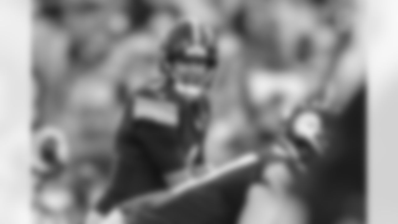 Take a look at photographs of Steelers quarterbacks from the 2022 season