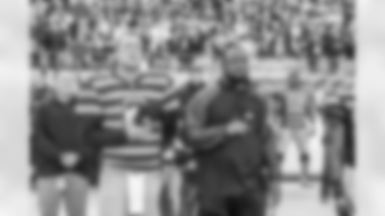 Ben Roethlisberger stands with head coach Mike Tomlin during the National Anthem before a game against the Indianapolis Colts. The Steelers defeated the Colts 51-34.