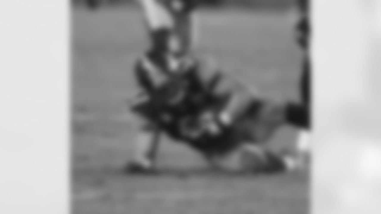 Action shot of linebacker James Farrior #51 during his time with the Pittsburgh Steelers.