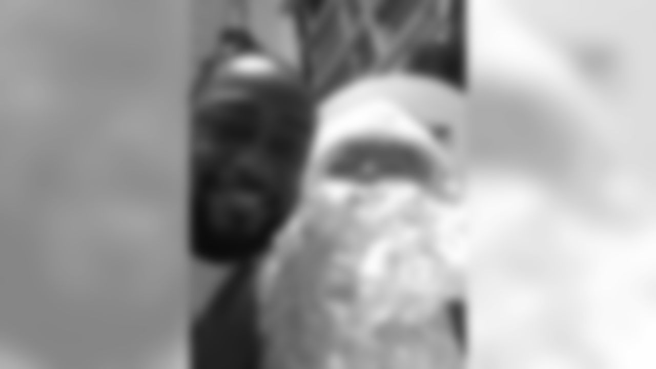 Coach Mike Tomlin and Santa Claus.