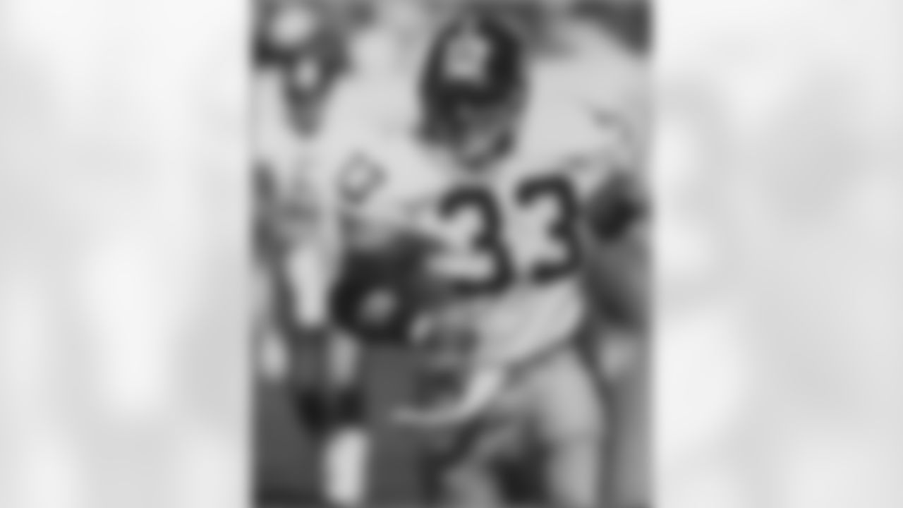 Action photograph of Merril Hoge.