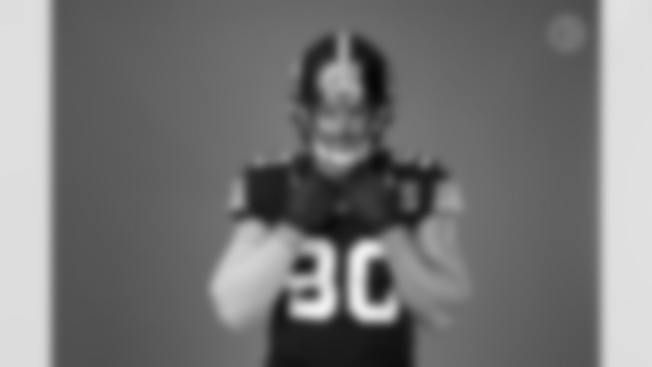 Pittsburgh Steelers linebacker T.J. Watt (90) wears the throwback uniform during a photoshoot, Tuesday, Nov. 15, 2022 in Pittsburgh, PA. (Karl Roser / Pittsburgh Steelers)