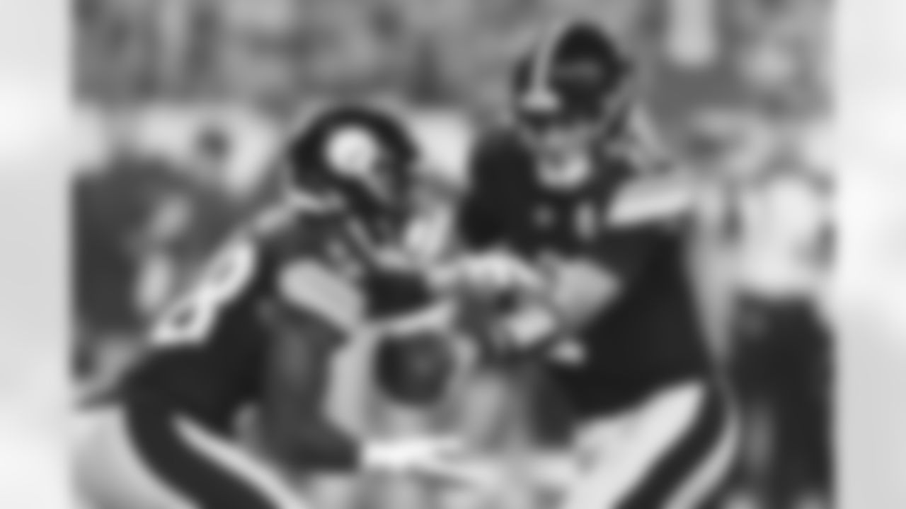 Pittsburgh Steelers running back Greg Bell (38) and Pittsburgh Steelers quarterback Mason Rudolph (2) during a preseason game between the Pittsburgh Steelers and the Buffalo Bills, Saturday, Aug. 19, 2023 in Pittsburgh, PA. (Karl Roser / Pittsburgh Steelers)