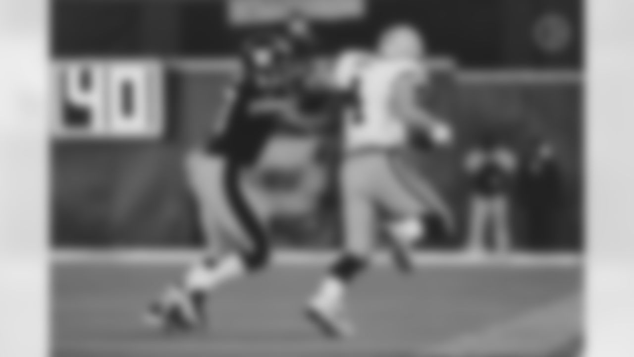 Action shot of safety Carnell Lake #37 from his time with the Steelers.