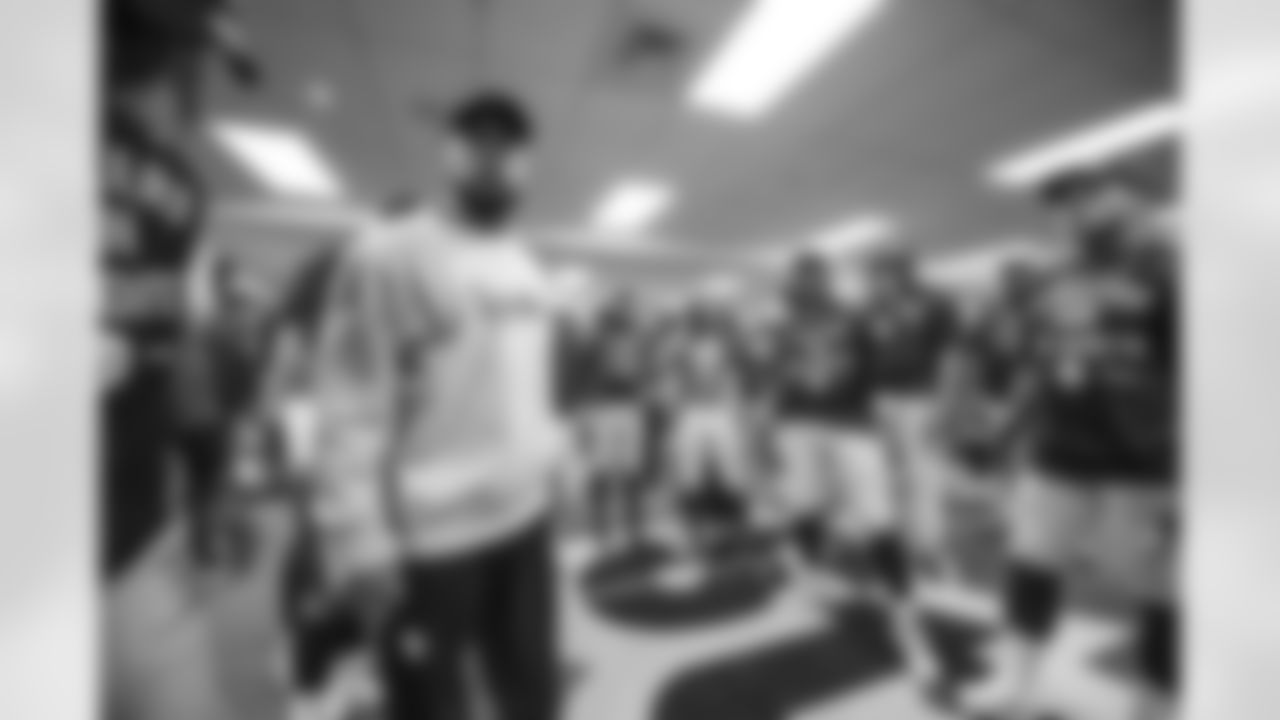 Mike Tomlin talks to his team in the locker room following the win vs the Cincinatti Bengals. The Steelers claimed the division title with the victory.