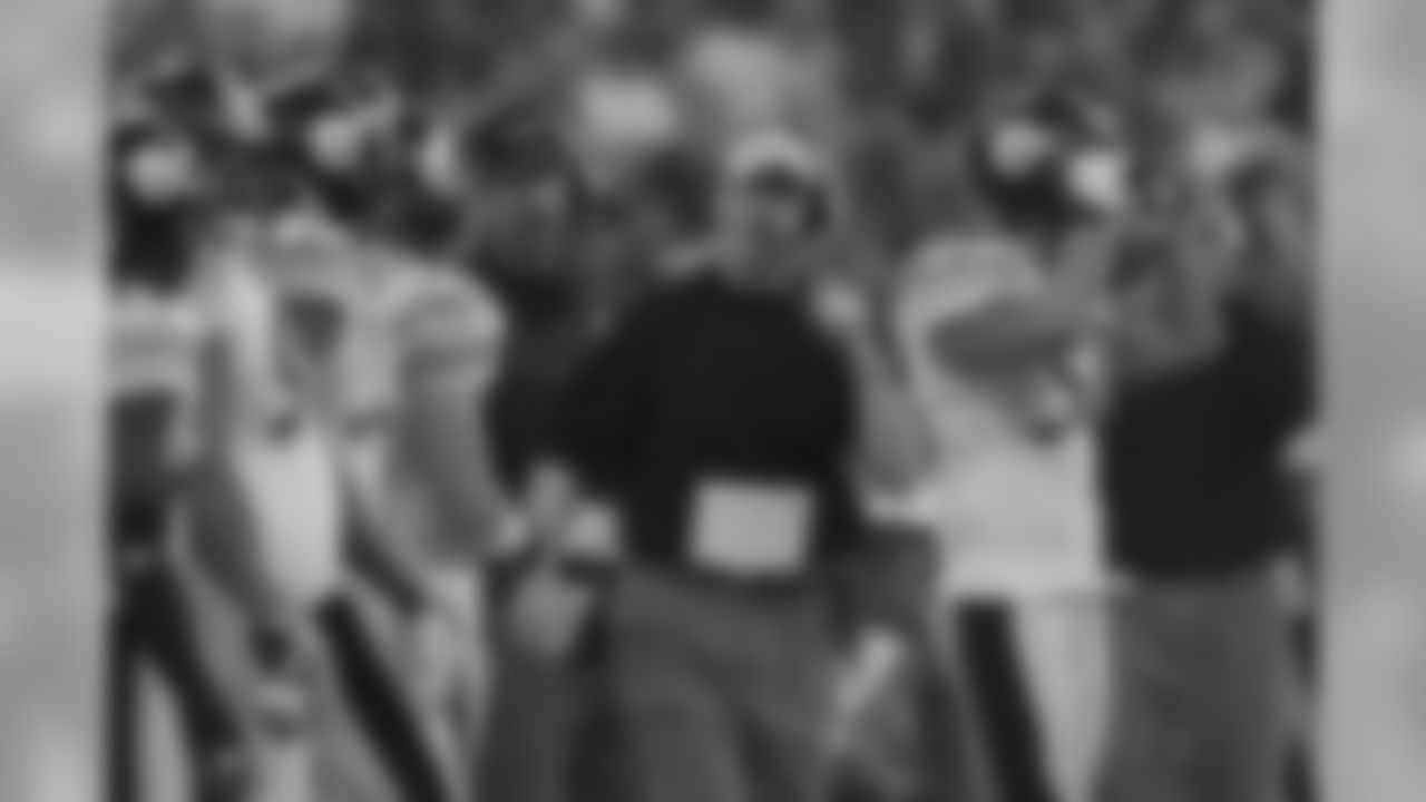 Candid photograph of head coach Bill Cowher on the sidelines during the AFC Divisional Playoff game between the Pittsburgh Steelers and the Indianapolis Colts, where the Steelers defeated the Colts 21-18.