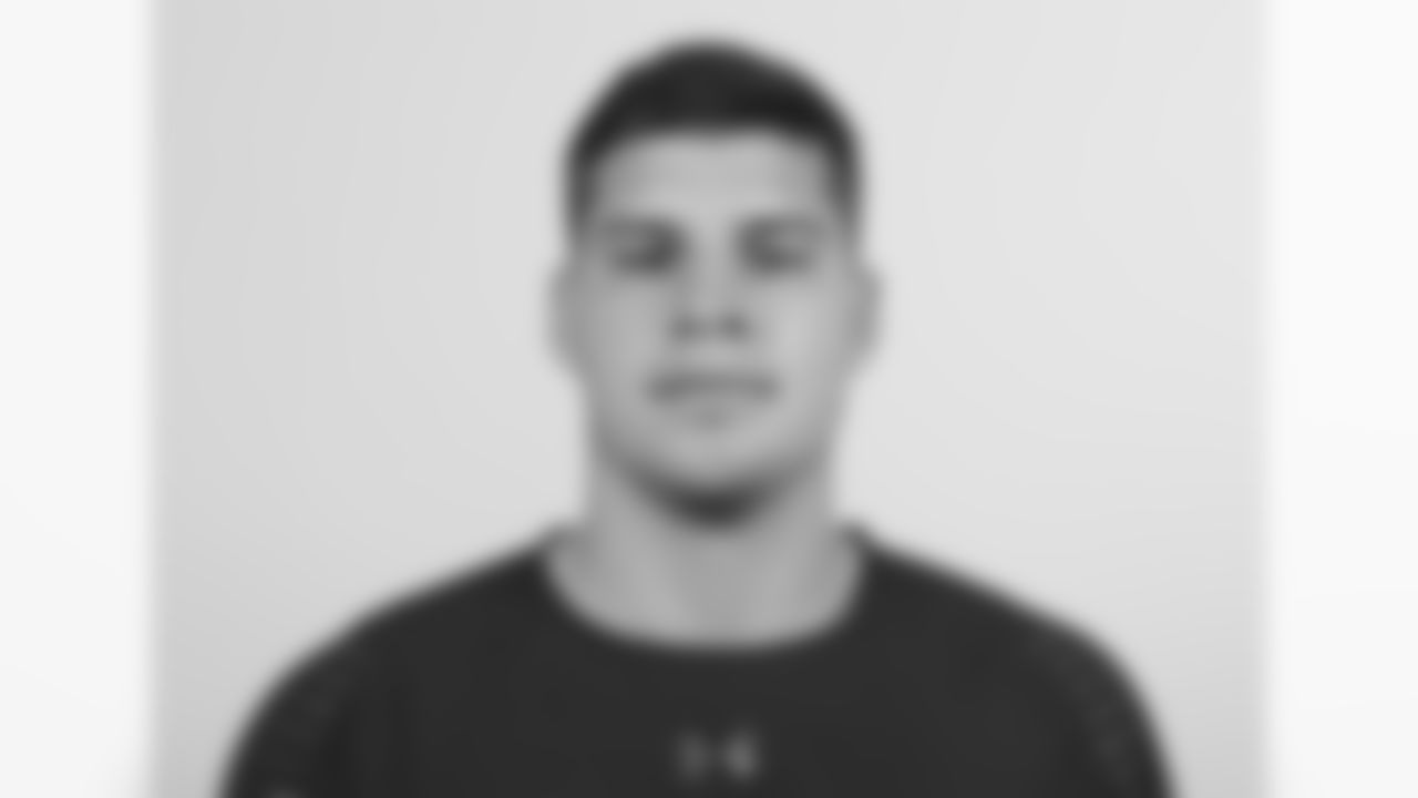 Oklahoma State quarterback Mason Rudolph poses for a headshot during the 2018 NFL Scouting Combine on Thursday, March 1, 2018 in Indianapolis. (Ben Liebenberg via AP)