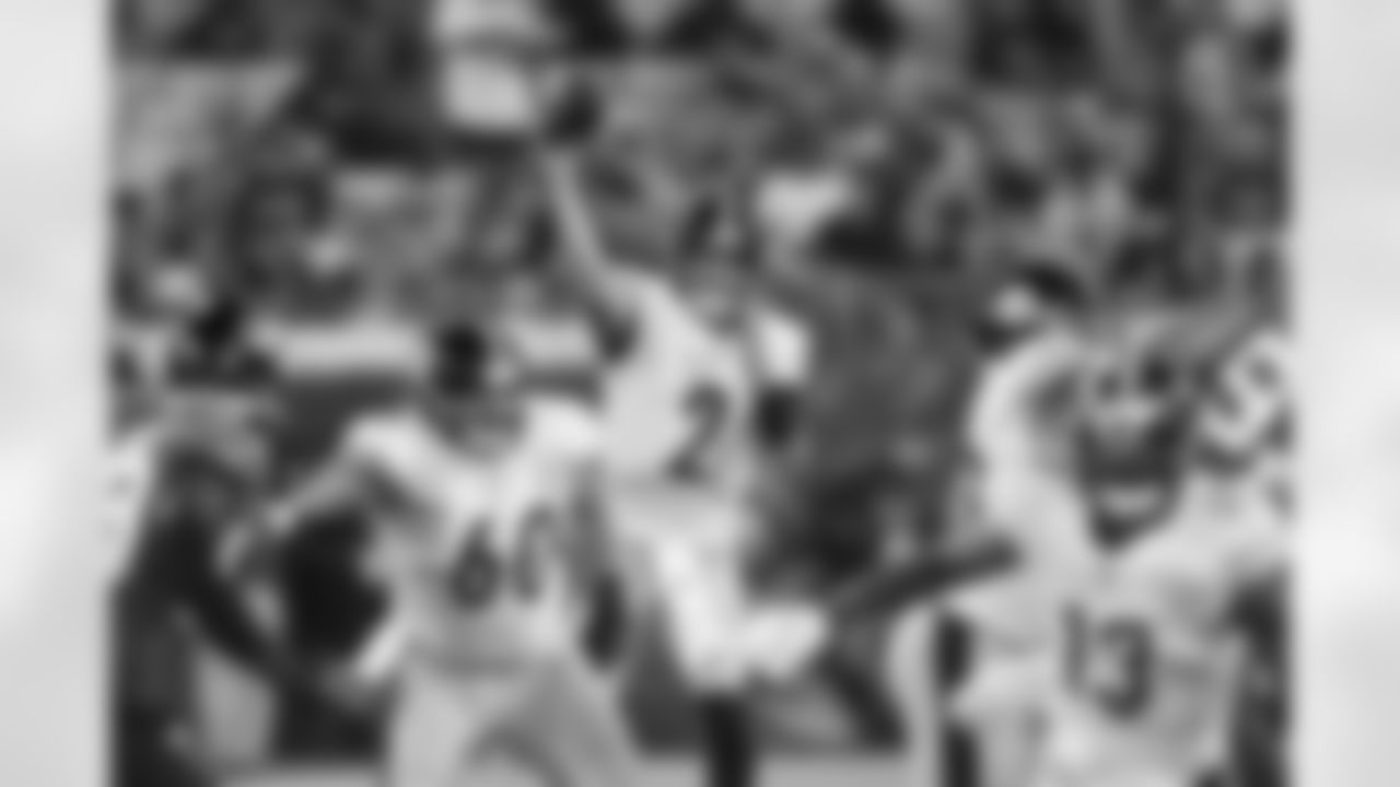 Take a look at photographs of Steelers quarterbacks from the 2022 season