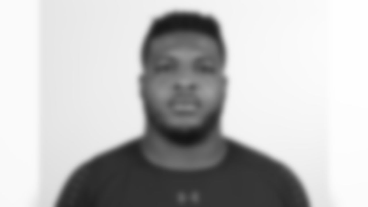 Western Michigan offensive lineman Chukwuma Okorafor poses for a headshot during the 2018 NFL Scouting Combine on Wednesday, Feb. 28, 2018 in Indianapolis. (Ben Liebenberg via AP)