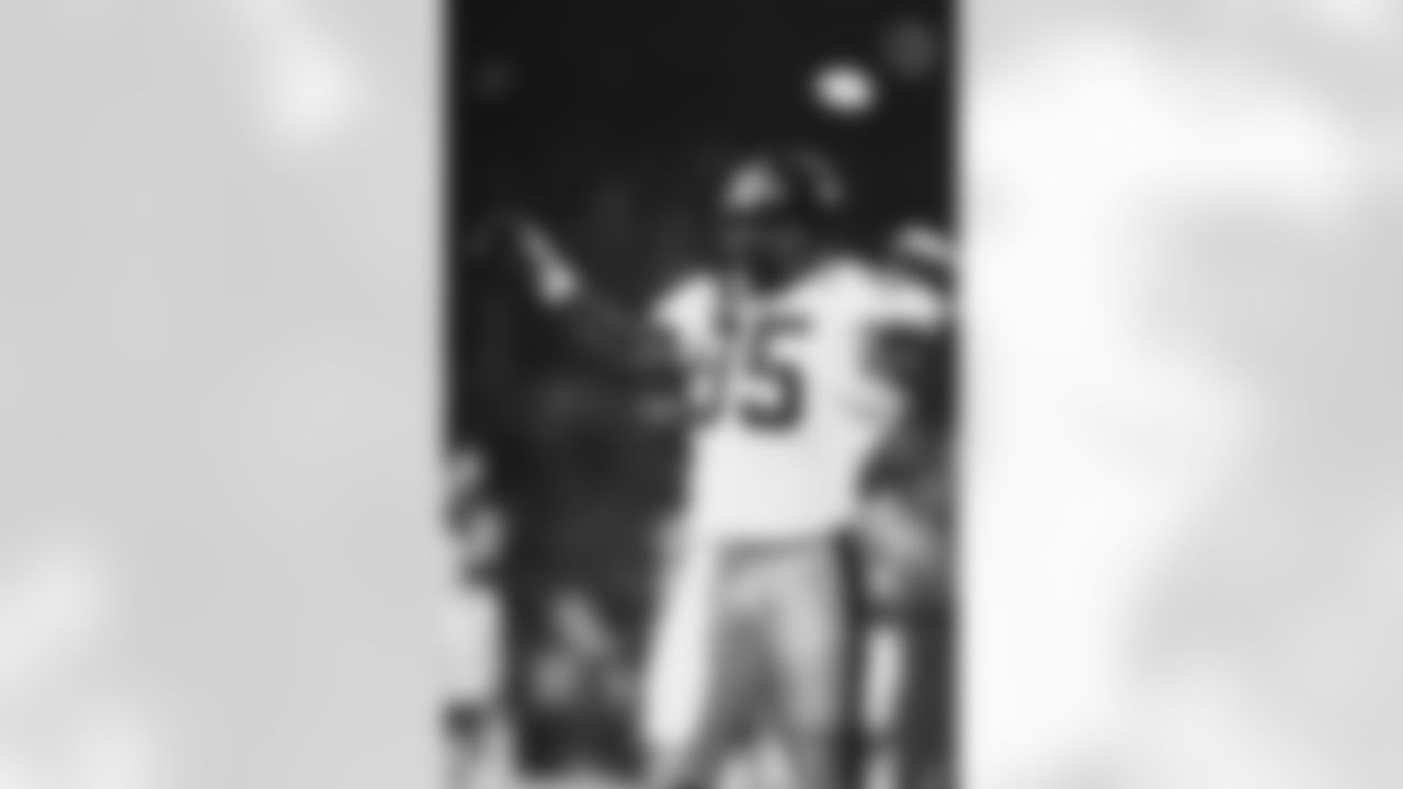 Action shot of linebacker Greg Lloyd #95 during his time with the Pittsburgh Steelers.