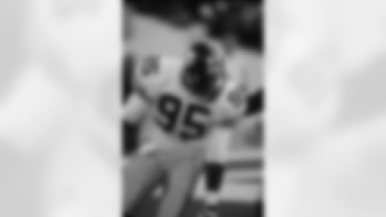 Action shot of linebacker Greg Lloyd #95 during his time with the Pittsburgh Steelers.