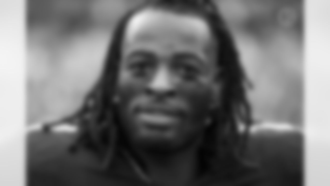 Pittsburgh Steelers running back Najee Harris (22) stands on the sidelines prior to his first NFL start. I captured this intimate portrait using an 85mm f1.4 lens. The shallow depth of field gave me the ability to draw attention to every bead of sweat on his face. (Karl Roser / Pittsburgh Steelers)