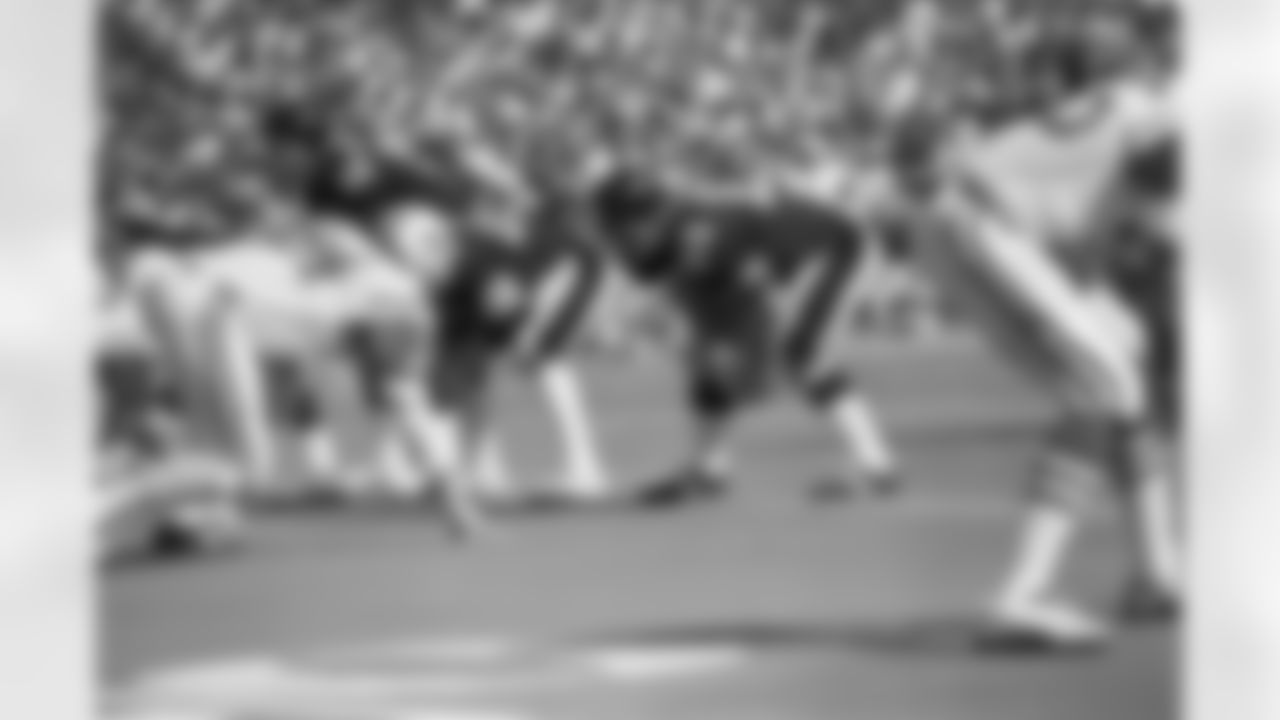 Action photograph of offensive lineman Jon Kolb #55 during his time with the Steelers.