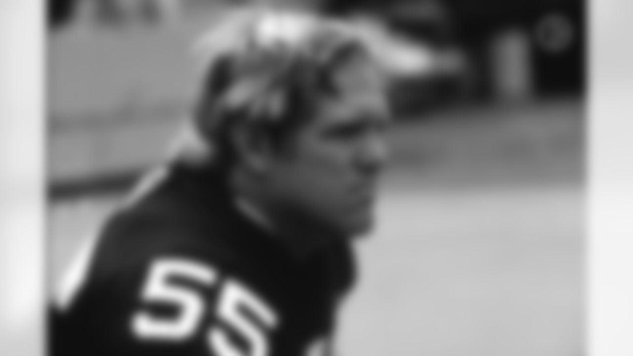 Action photograph of offensive lineman Jon Kolb #55 during his time with the Steelers.
