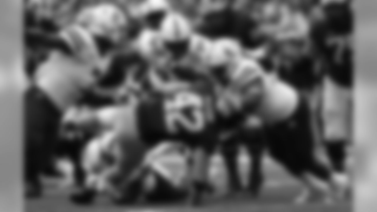 Michigan fullback Ben Mason (42) is brought down by Nebraska defensive lineman Carlos Davis (96) in the first half of an NCAA football game in Ann Arbor, Mich., Saturday, Sept. 22, 2018. (AP Photo/Paul Sancya)