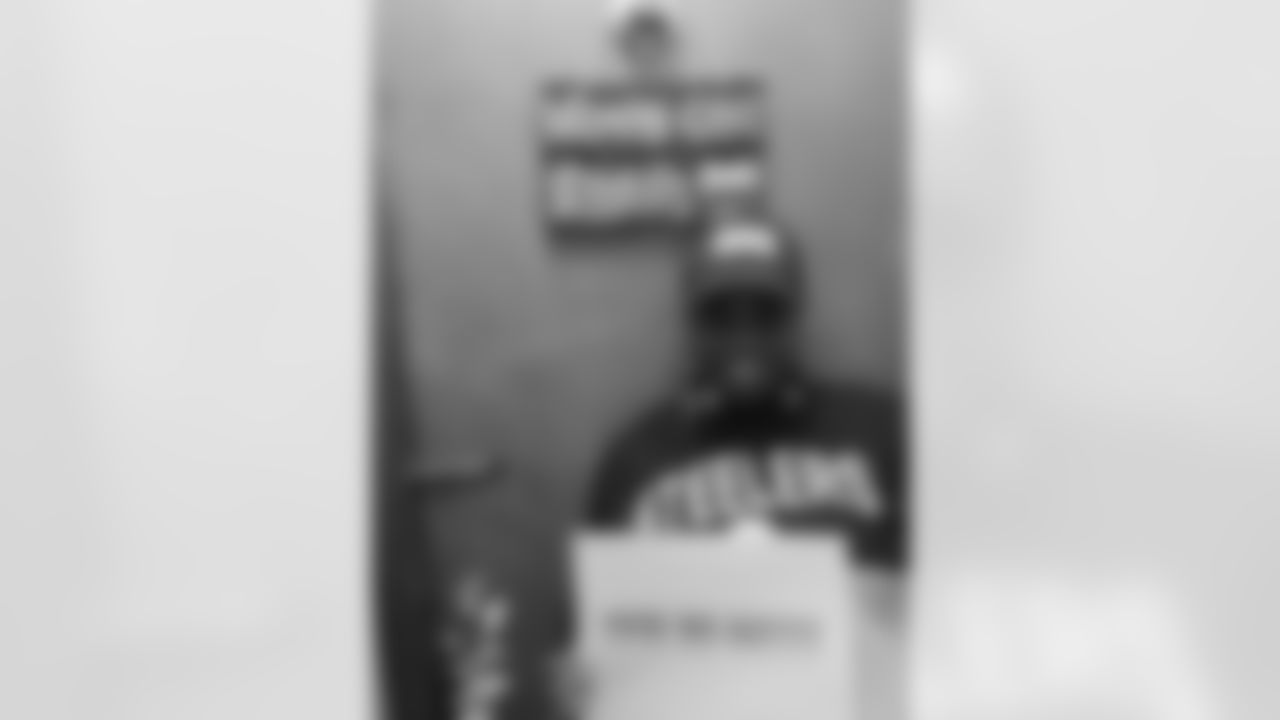 SNUTraditions_HereWeGoSigns_Jan142022505PM_Parker_Kimberly_97494590_HEREWEGO.jpeg_97494590_HEREWEGO