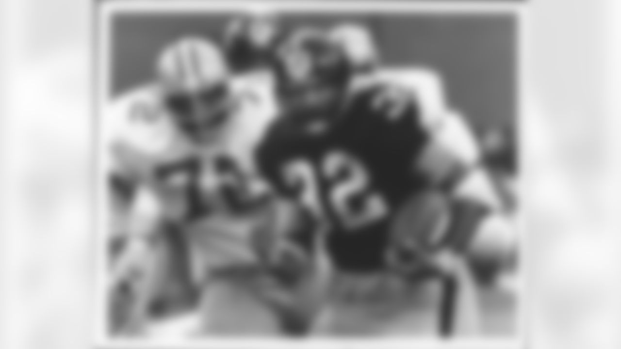 11,950 career rushing yards.