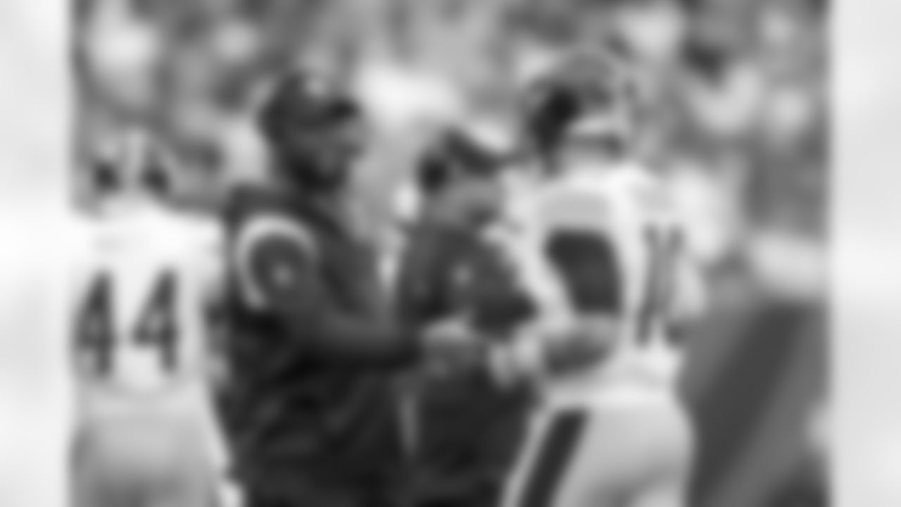 Pittsburgh Steelers Head Coach Mike Tomlin and Pittsburgh Steelers quarterback Mitch Trubisky (10) during a regular season game between the Pittsburgh Steelers and the Cincinnati Bengals, Sunday, Sept. 11, 2022 in Cincinnati, OH. The Steelers beat the Bengals in OT 23-20. (Karl Roser / Pittsburgh Steelers)