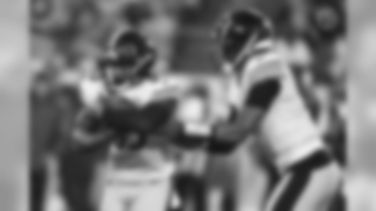 Travon McMillian and Joshua Dobbs