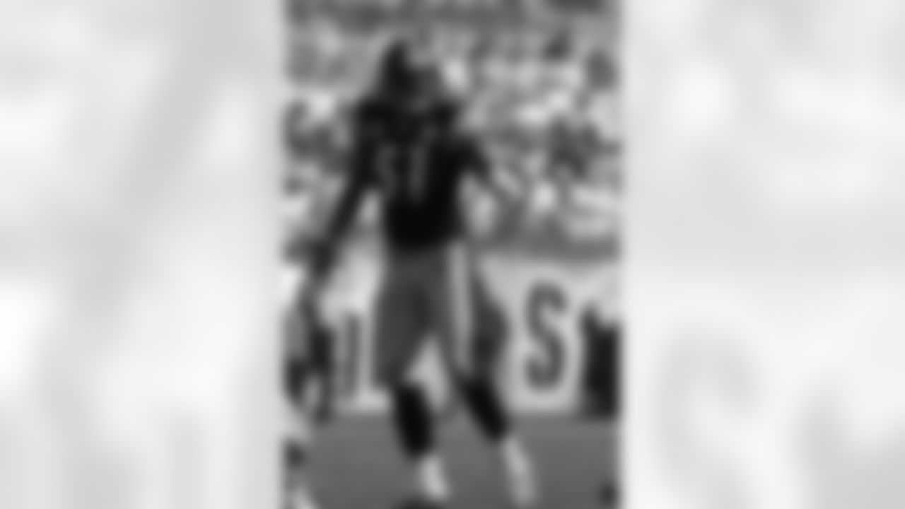 Action shot of linebacker James Farrior #51 during his time with the Pittsburgh Steelers.