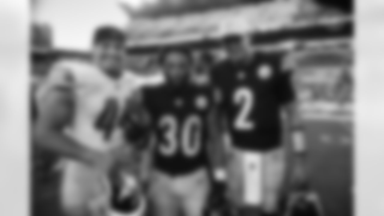 Pittsburgh Steelers running back Jaylen Warren (30) and Pittsburgh Steelers quarterback Mason Rudolph (2) during a preseason game between the Pittsburgh Steelers and the Detroit Lions, Sunday, Aug. 28, 2022 in Pittsburgh, PA. (Abigail Dean / Pittsburgh Steelers)